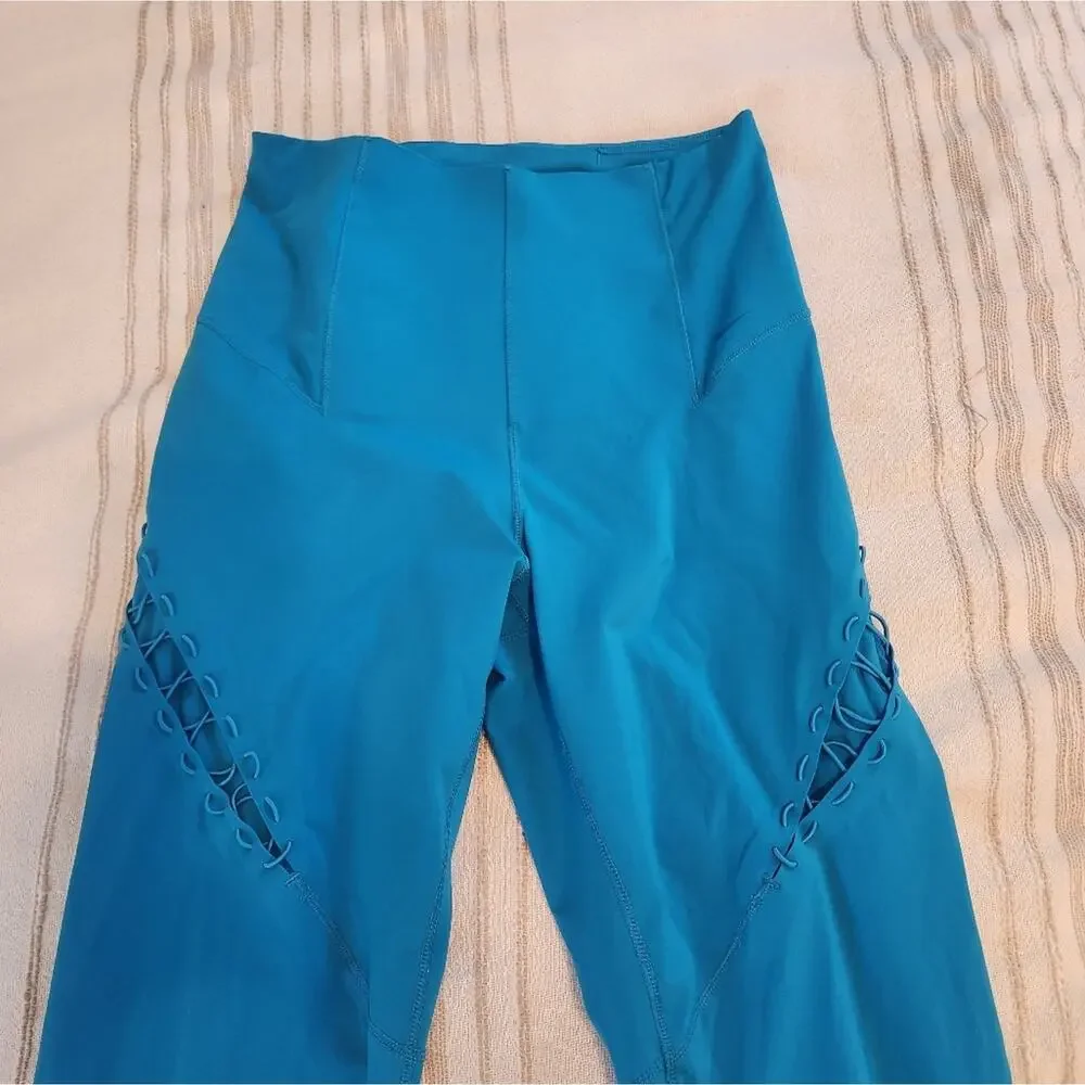 NIKE Dri fit Bungee Detail workout leggings In Aqua Blue XS